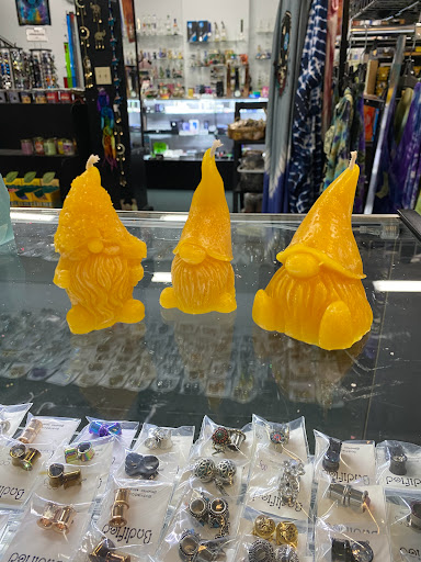 Explore tattoo behind ear ideas, creative tattoo ideas in Oswego, available at Bodified