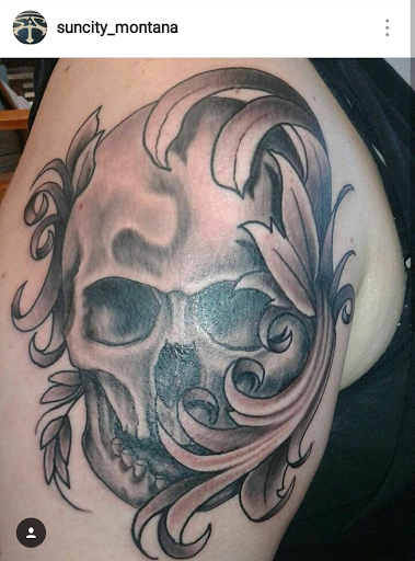 Explore ghost cat tattoo ideas, creative tattoo ideas in El Paso, available at Sun City Tattoo Montana