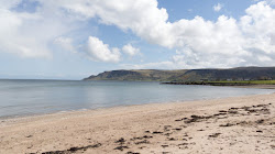 Foto de Cushendall Beach - lugar popular entre os apreciadores de relaxamento