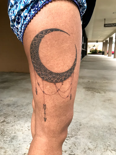 Explore men's back of neck tattoo ideas, creative tattoo ideas in Raleigh, available at Tattoos by Anton