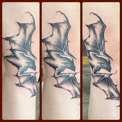 Explore dark tattoos ideas, creative tattoo ideas in Cheyenne, available at The T.R.I.B.E. Zoo, LLC Tattoo