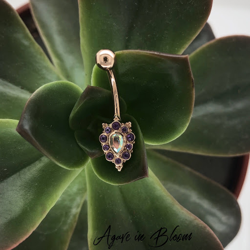 Find small bird tattoo ideas for your next unique tattoo in Medford at Agave in Bloom Piercing & Fine Jewelry