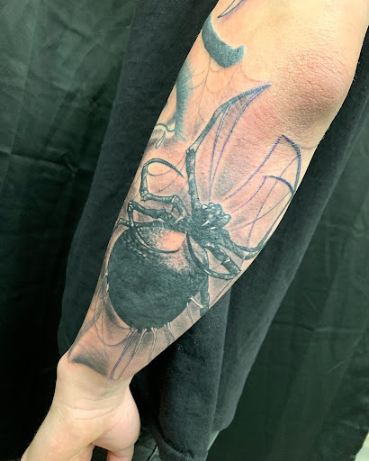 Explore dead dog tattoo ideas, creative tattoo ideas in Sparks, available at Empire Tattoo