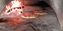 Plats et boissons du Pizzas à emporter Pizza au feu de bois GUIDO à Nîmes - n°11