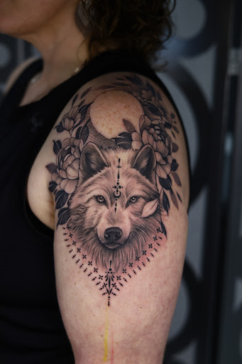 Explore magician tattoo ideas, creative tattoo ideas in Southfield, available at Enki Tattoo