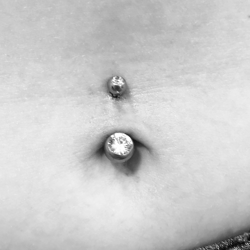Explore rib tattoo ideas, creative tattoo ideas in Palm Harbor, available at Angry Owl Tattoo and Piercing