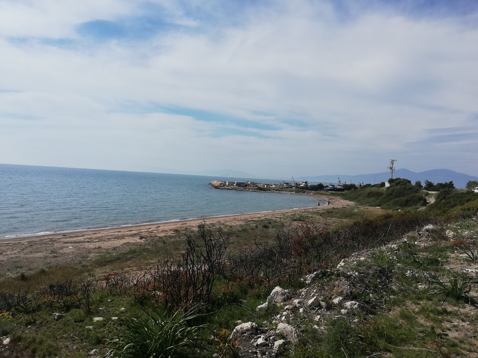 Foto von Gulbahce beach IV mit beiger sand Oberfläche
