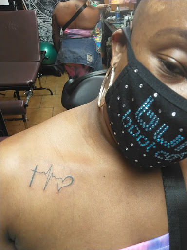 Tattoo Shop «Sacred-X-Pressions Tattoo Studio», reviews and photos, 134 Miracle Strip Pkwy SE, Fort Walton Beach, FL 32548, USA