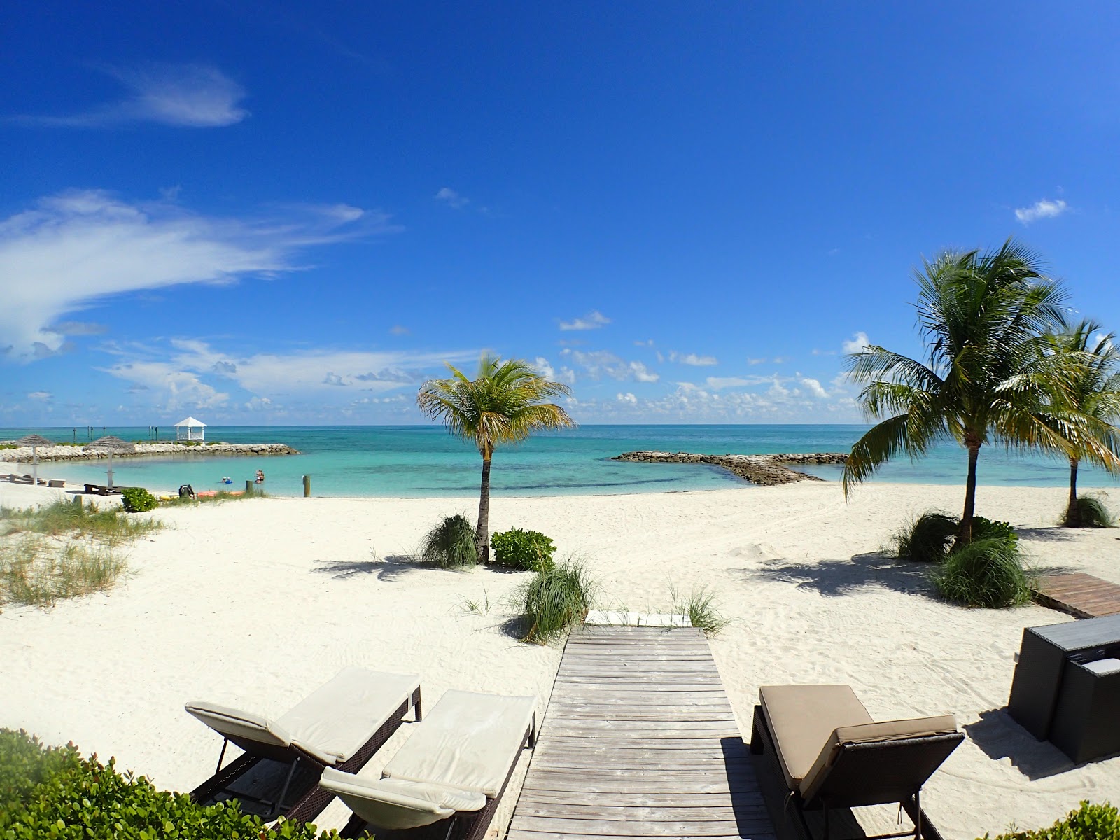 Photo of Treasure Cove beach with spacious multi bays