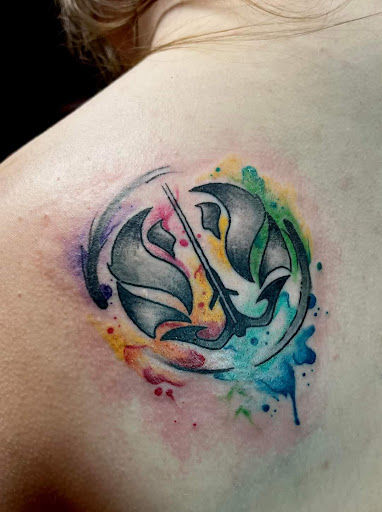 Find tattoo crown ideas for your next unique tattoo in Valparaiso at Elysium Studios