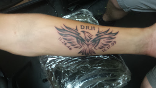 Explore arm sleeve tattoo ideas for men, creative tattoo ideas in Elyria, available at Body Revolution Tattoos & Body Piercings