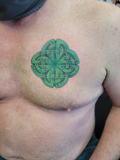 Explore wrestling tattoos ideas, creative tattoo ideas in Huntington Station, available at Station 1 Tattoo