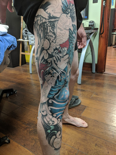 Explore tattoo background shading ideas, creative tattoo ideas in San Diego, available at Bearcat Tattoo Gallery