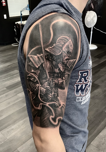 Explore dog tag tattoo ideas, creative tattoo ideas in Silver City, available at Independent Ink Tattoo