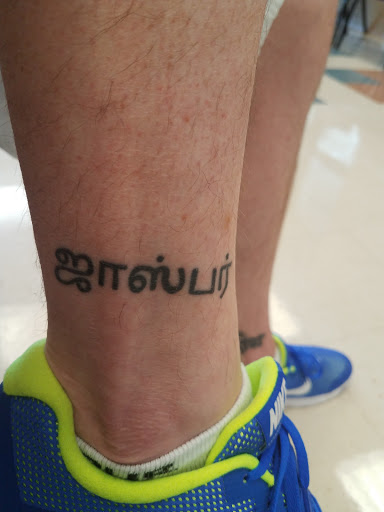 Find women's rib tattoo ideas for your next unique tattoo in Northport at Cynical Tattoos Shop