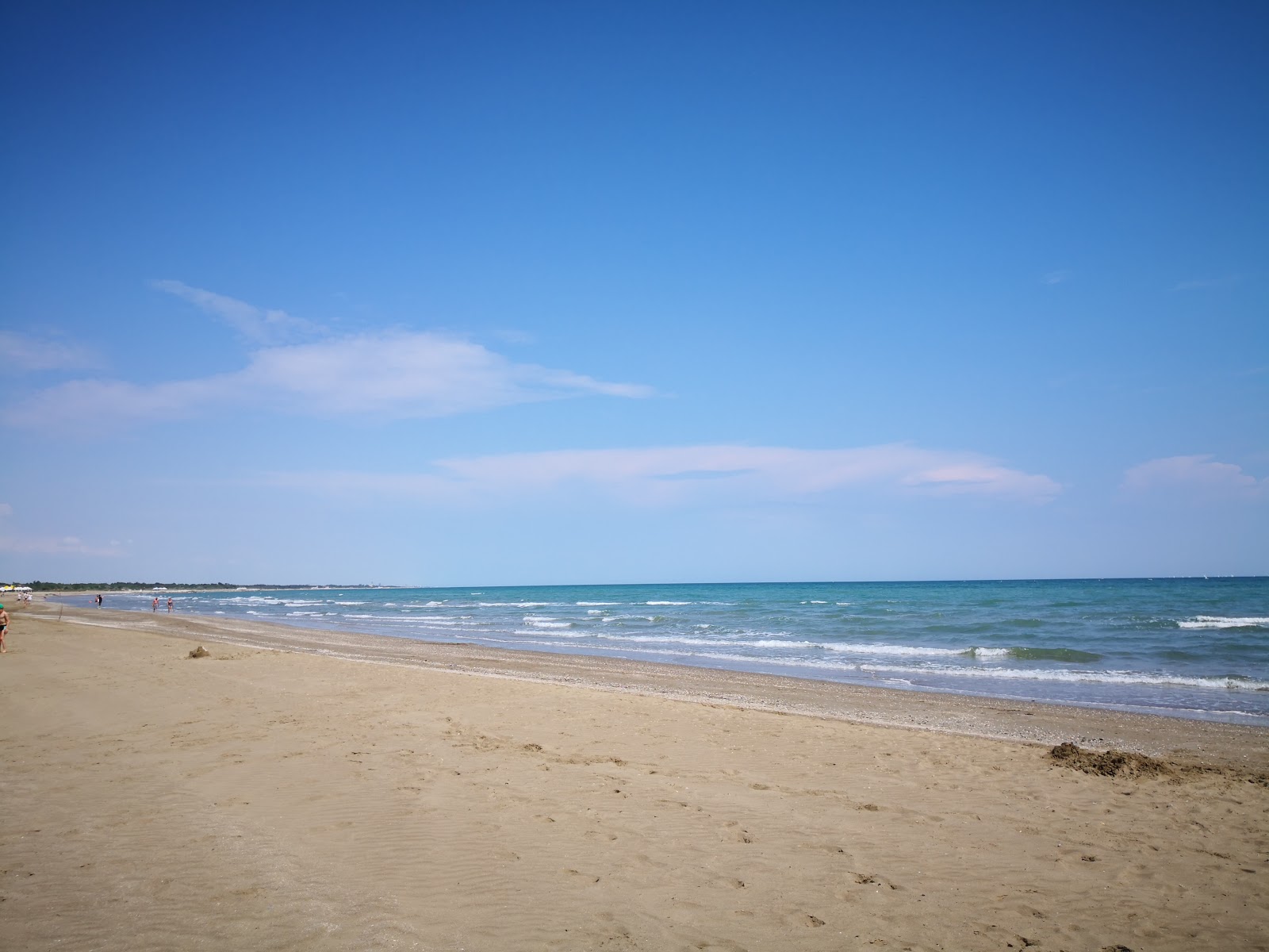 Fotografie cu beach Punta Sabbioni cu o suprafață de nisip fin strălucitor