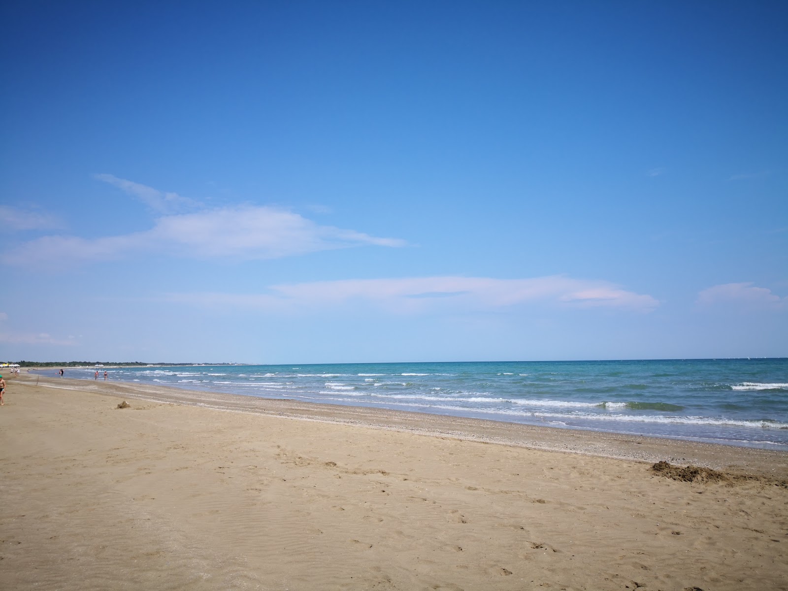 Foto van Spiaggia Marina di Venezia met beige zand oppervlakte