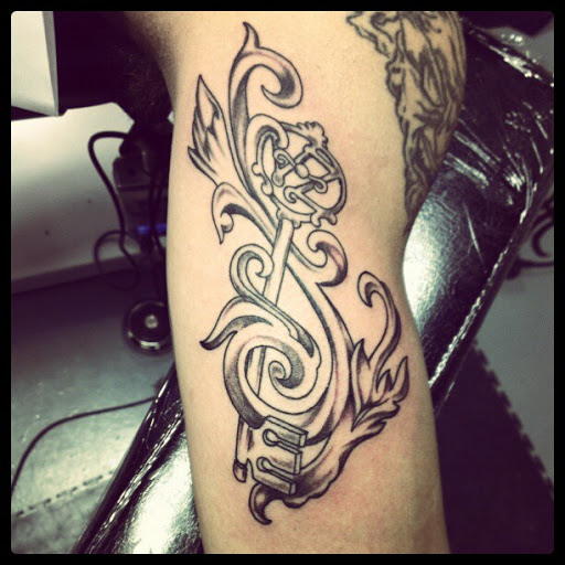 Explore dark fantasy tattoo ideas, creative tattoo ideas in Elkhart, available at Legendary Ink Tattoo and Piercing Studio