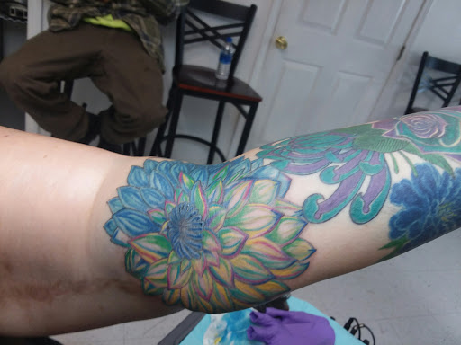 Explore pizza tattoo ideas, creative tattoo ideas in Salem, available at Outwest Tattoo and body piercing ,30 years of tattooing,only life time guarantee