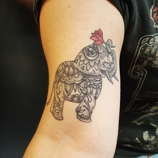 Explore tattoo ideas for first born son, creative tattoo ideas in Houston, available at 3rd Coast Custom Tattoos & Body Piercings Studio