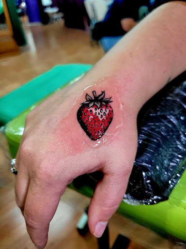 Find tattoo ideas angels for your next unique tattoo in Benton at Spectrum Tattoo