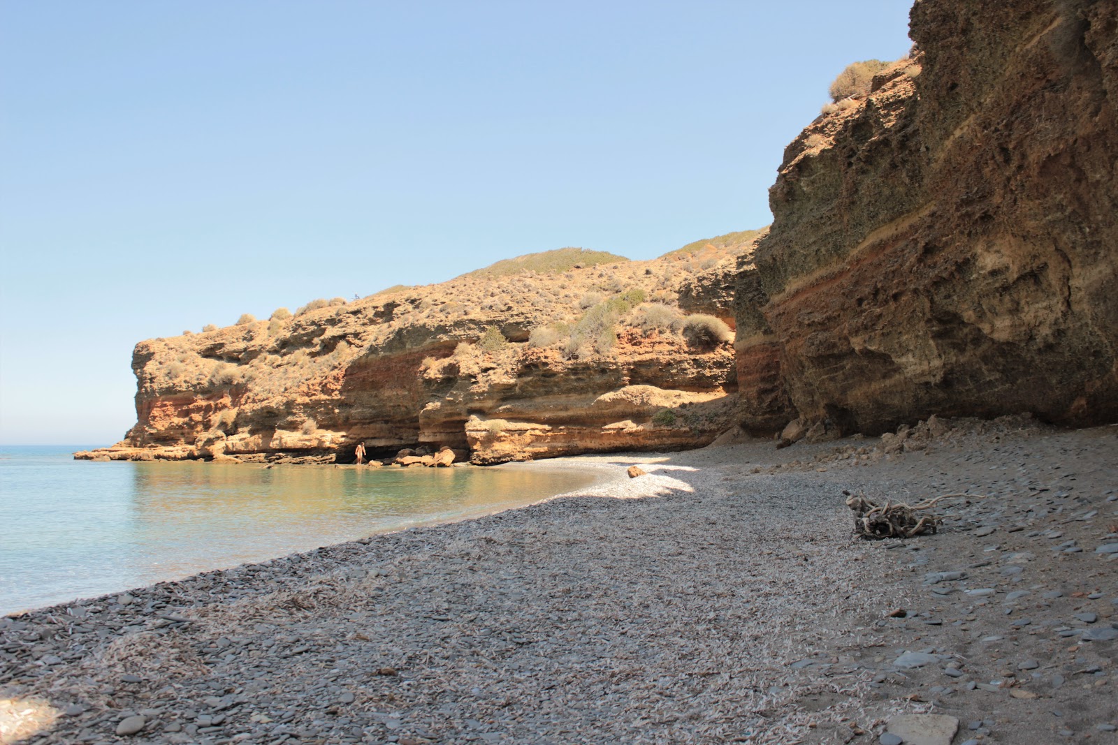 Photo of Papa Mina Beach with gray fine pebble surface