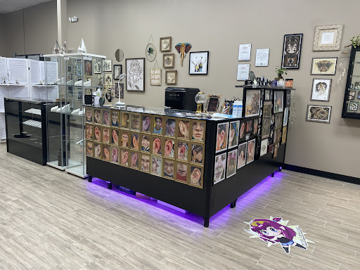 Explore red bird tattoo ideas, creative tattoo ideas in Houston, available at Body Art Piercing Studio