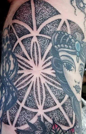 Tattoo Shop «Flesh To Fantasy Tattoo Emporium», reviews and photos, 721 S Main St, Bellefontaine, OH 43311, USA