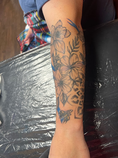 Explore ladies hand tattoo ideas, creative tattoo ideas in Green Cove Springs, available at Under Your Skin Tattoos
