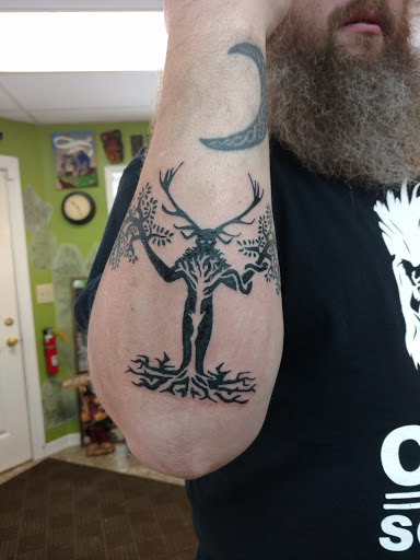 Explore tattoo ideas dogs, creative tattoo ideas in East Moline, available at Painted Monkey Tattoo