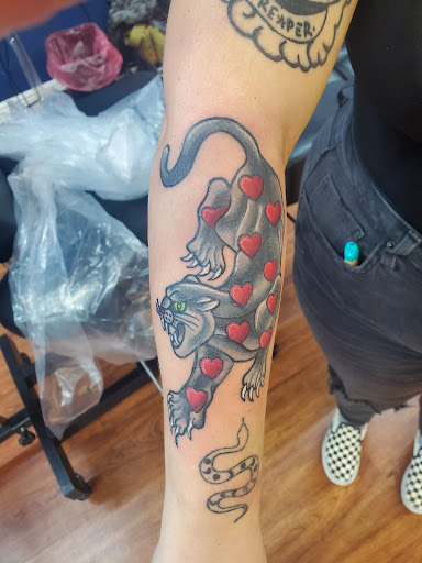 Find tattoo ideas black for your next unique tattoo in Cocoa at Rorschach Tattoo Shop and Piercing Studio