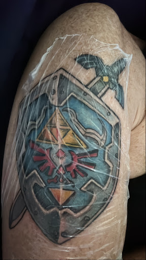 Explore sword art online tattoo ideas, creative tattoo ideas in Cocoa, available at Rorschach Tattoo Shop and Piercing Studio