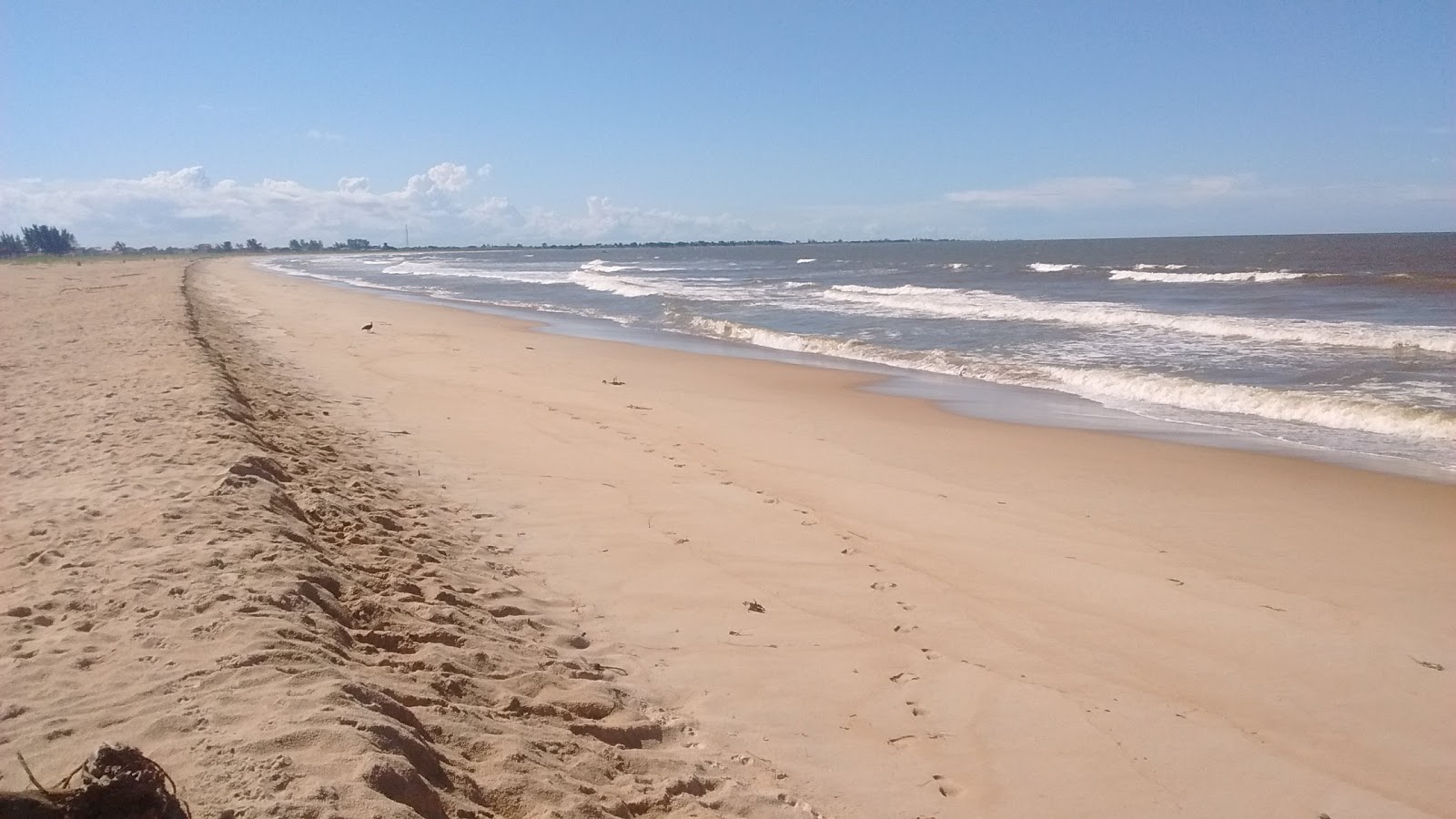 Foto de Praia de Santa Clara com água turquesa superfície