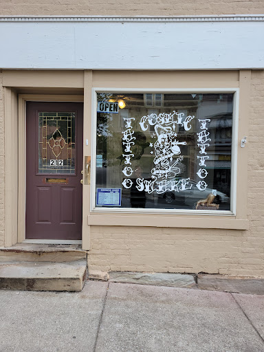 Explore unique tramp stamp tattoo ideas, creative tattoo ideas in Hollidaysburg, available at Cosmic Snake Tattoo