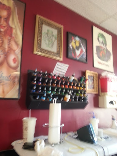 Tattoo Shop «Stained Skin Tattoo Studio», reviews and photos, 405 W Main St, Newark, OH 43055, USA