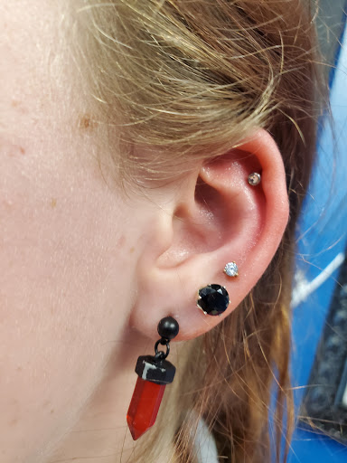 Explore small dog tattoo ideas, creative tattoo ideas in Garden Grove, available at Ashes 2 Ink Tattoo and Piercing LLC