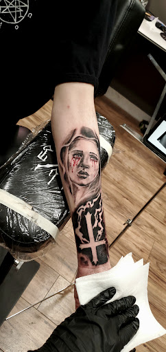 Explore american traditional chest tattoo ideas, creative tattoo ideas in Sheridan, available at Beard N Lady Tattoo