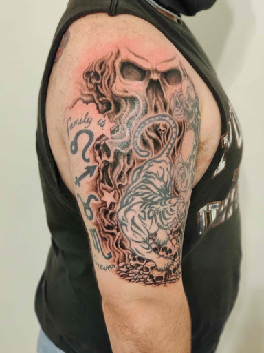 Explore top of the foot tattoo ideas, creative tattoo ideas in Hebron, available at Explosive Ink Tattoo