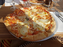 Pizza du Restaurant Helio's à Versailles - n°8