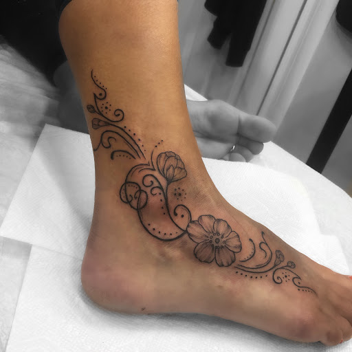 Explore mens tattoo ideas upper arm, creative tattoo ideas in Sandy Spring, available at Tantric Tattoo Boutique