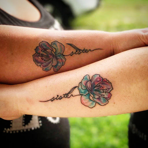 Explore small behind ear tattoo ideas, creative tattoo ideas in Spartanburg, available at The Gallery Tattoo Shop Spartanburg