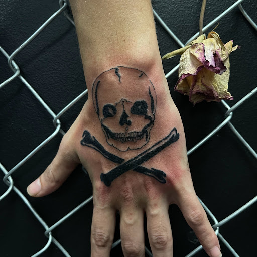 Explore sport tattoo ideas, creative tattoo ideas in Buffalo, available at True Gloom Tattoo Studio