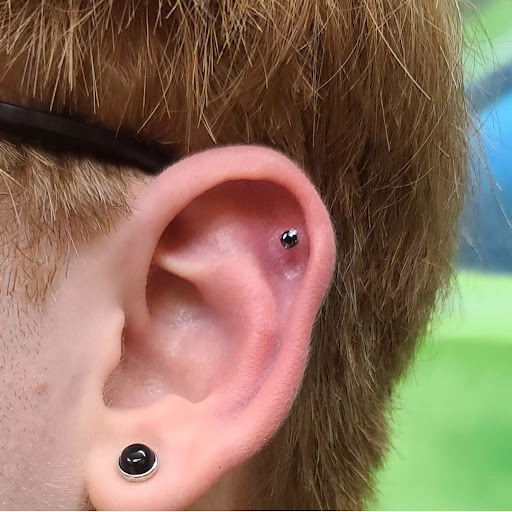 Explore anthony bourdain tattoo ideas, creative tattoo ideas in Abington, available at Ink Boss Tattoo & Piercing Studio