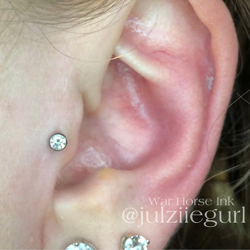 Explore love symbol tattoo ideas, creative tattoo ideas in Kent, available at War Horse Ink