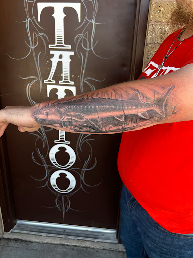 Explore men arm sleeve tattoo ideas, creative tattoo ideas in Elko, available at Freedom Tattoo