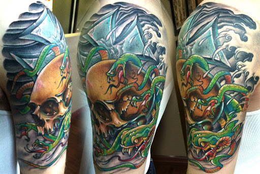 Explore tattoo ideas for men upper arm, creative tattoo ideas in Lodi, available at Emerald Tattoo & Piercing - Lodi
