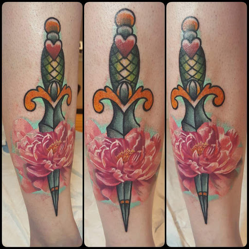 Explore feminine cross tattoo ideas, creative tattoo ideas in Brunswick, available at Black Element Tattoo