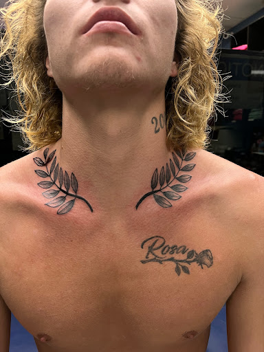 Explore cover up tattoo ideas on arm, creative tattoo ideas in Foley, available at Symbolic Ink Tattoo Studio