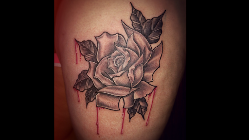 Explore trapezius tattoo ideas, creative tattoo ideas in Macon, available at Barefoot Ink