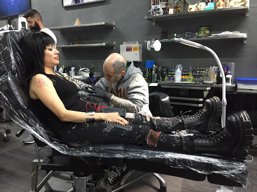 Explore men's neck tattoo ideas, creative tattoo ideas in Hollywood, available at Sacred Eye Tattoos